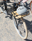 Rear rack of Bluejay e-bike holding Thousand bike helmet