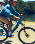 Child and father riding Bluejay electric bikes kids' e-bikes