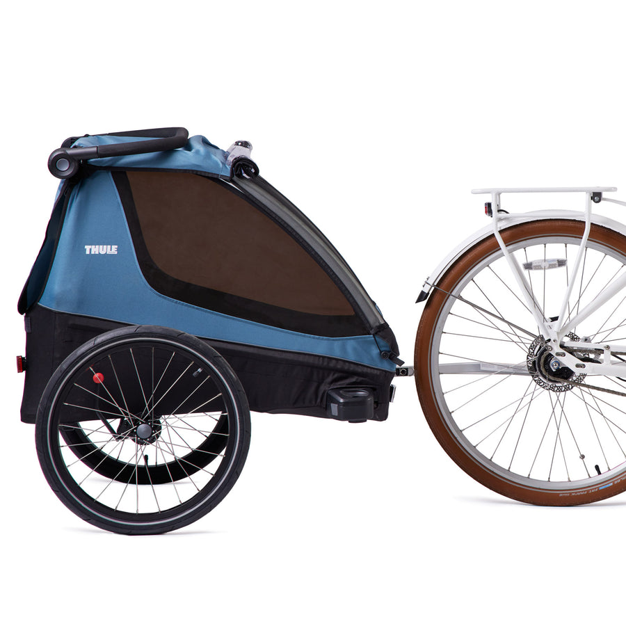 Thule child trailer on Bluejay Premiere edition white electric bike e-bike accessory 