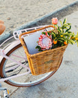 Flours in Pannier Nantucket basket on Bluejay e-bike in Blush Pink