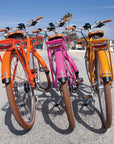 Bluejay Premiere Edition e-bikes in Citrus Orange, Hot Pink and Golden Yellow 