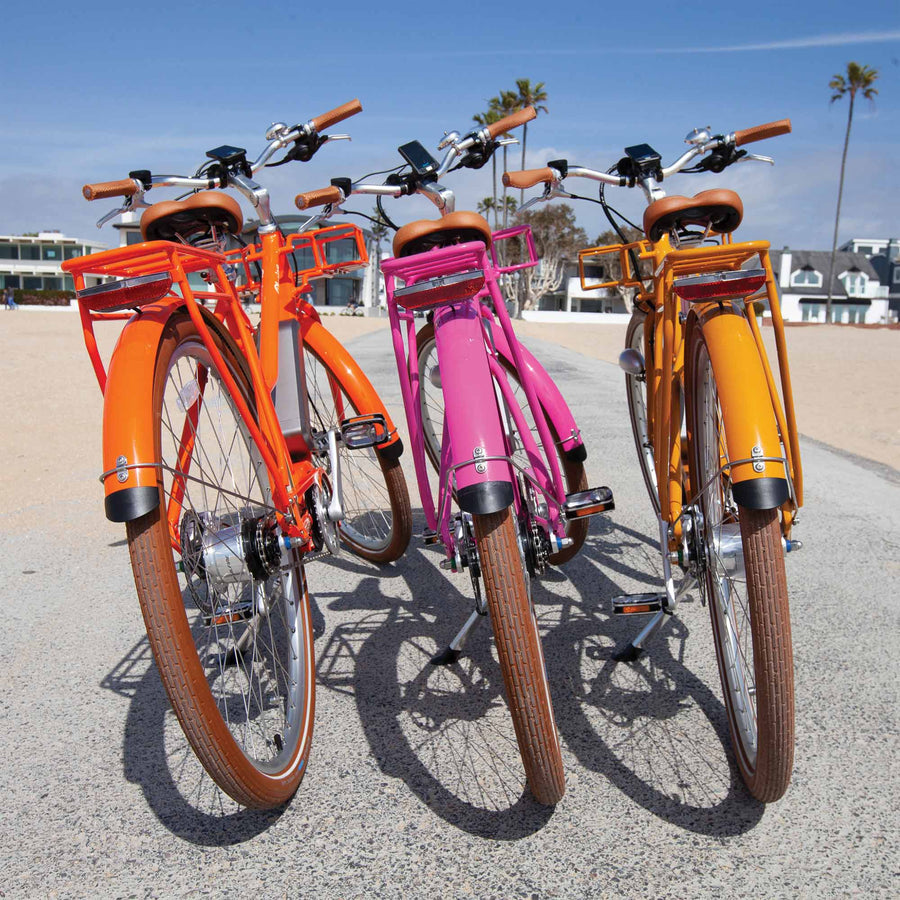 Bluejay Premiere Edition e-bikes in Citrus Orange, Hot Pink and Golden Yellow 