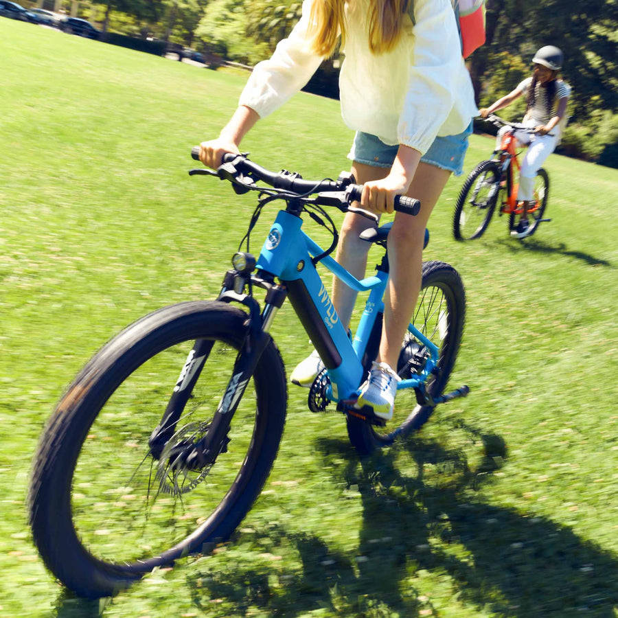 Kids riding Bluejay WILD electric bikes e-bikes