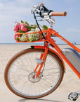 front of citrus orange electric bike by Bluejay