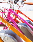 Bluejay Premiere Edition electric bikes orange e-bike pink e-bike 